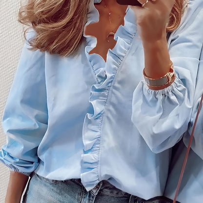 Angeline Blus Dam - Elegant Vit Blus med Ruffle Detalj och Voluminösa Ärmar